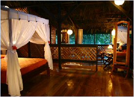 Wooden cabins provide cozy accommodations at Almendros y Corales in Manzanillo, Costa Rica