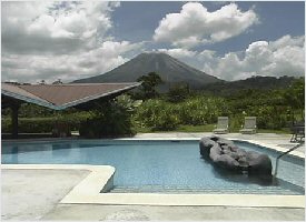 Arenal Volcano view from the pool at Arenal Springs Resort in Costa Rica