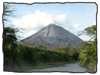 The impresive Arenal Volcano seen from a river crossing