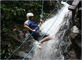 Rappel down a waterfall in Costa Rica