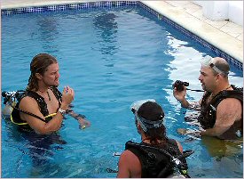 First lesson of diving in a pool