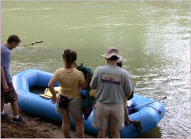 Board your raft with all safety equipment